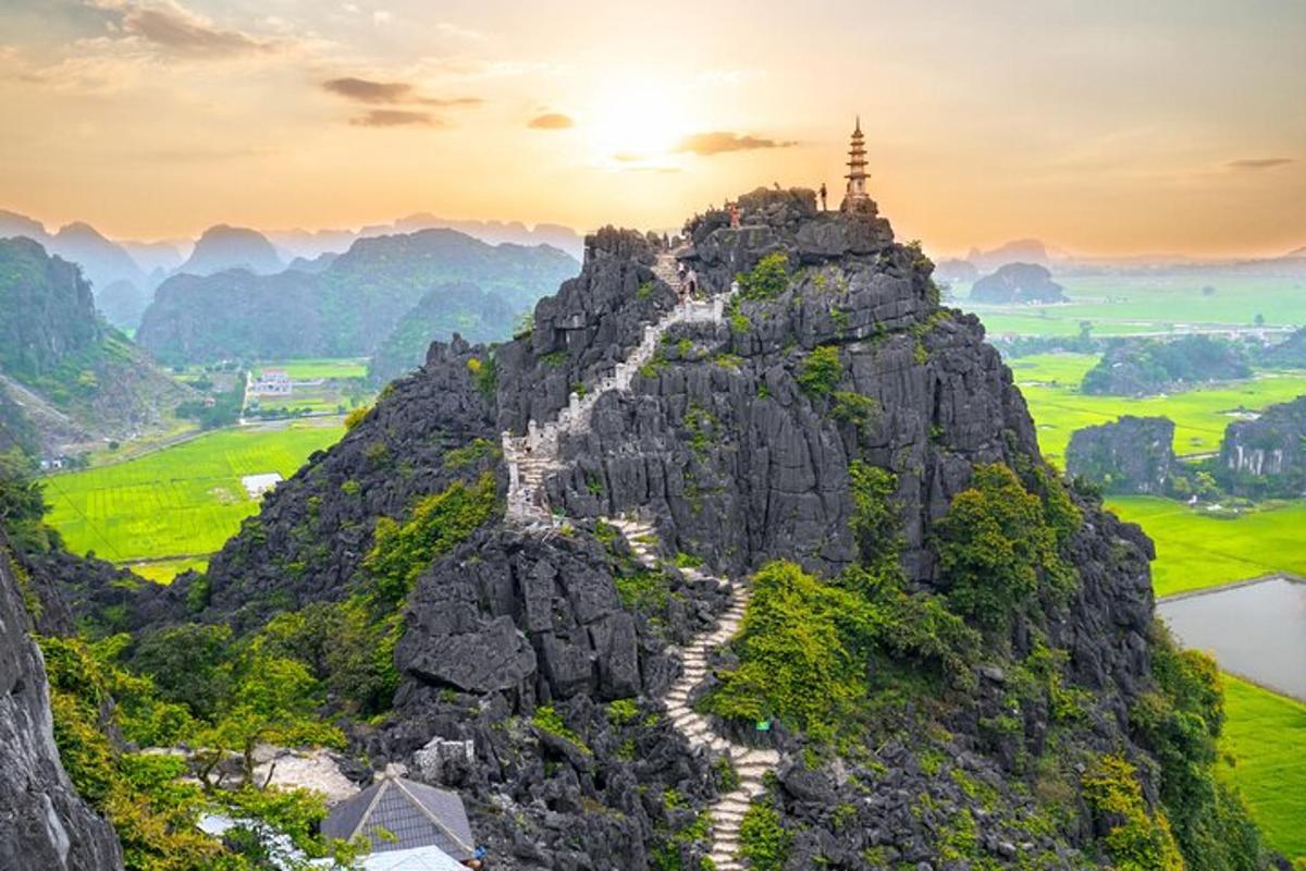 a mountain with a temple on top of it