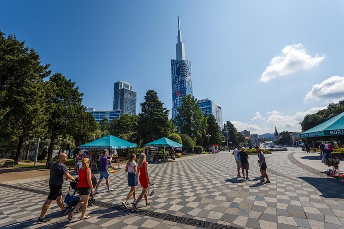 a group of people walking around in a park
