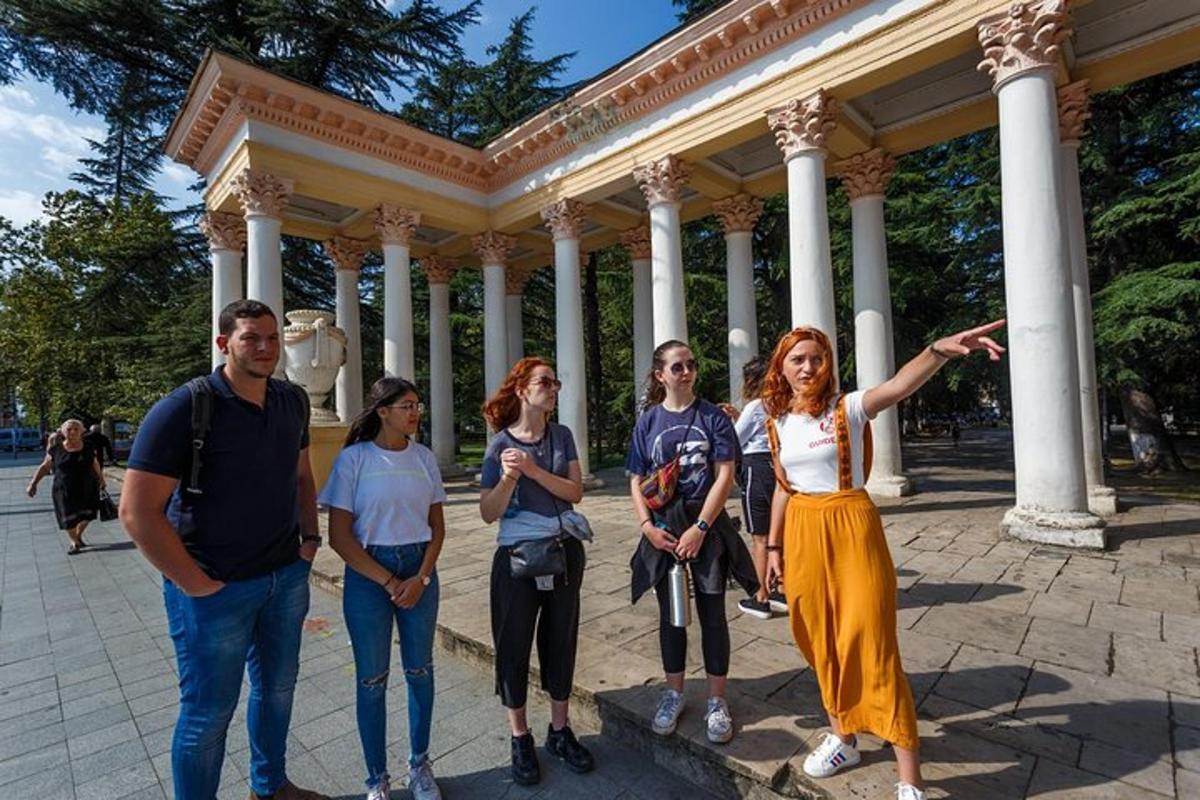a group of people standing in front of a building