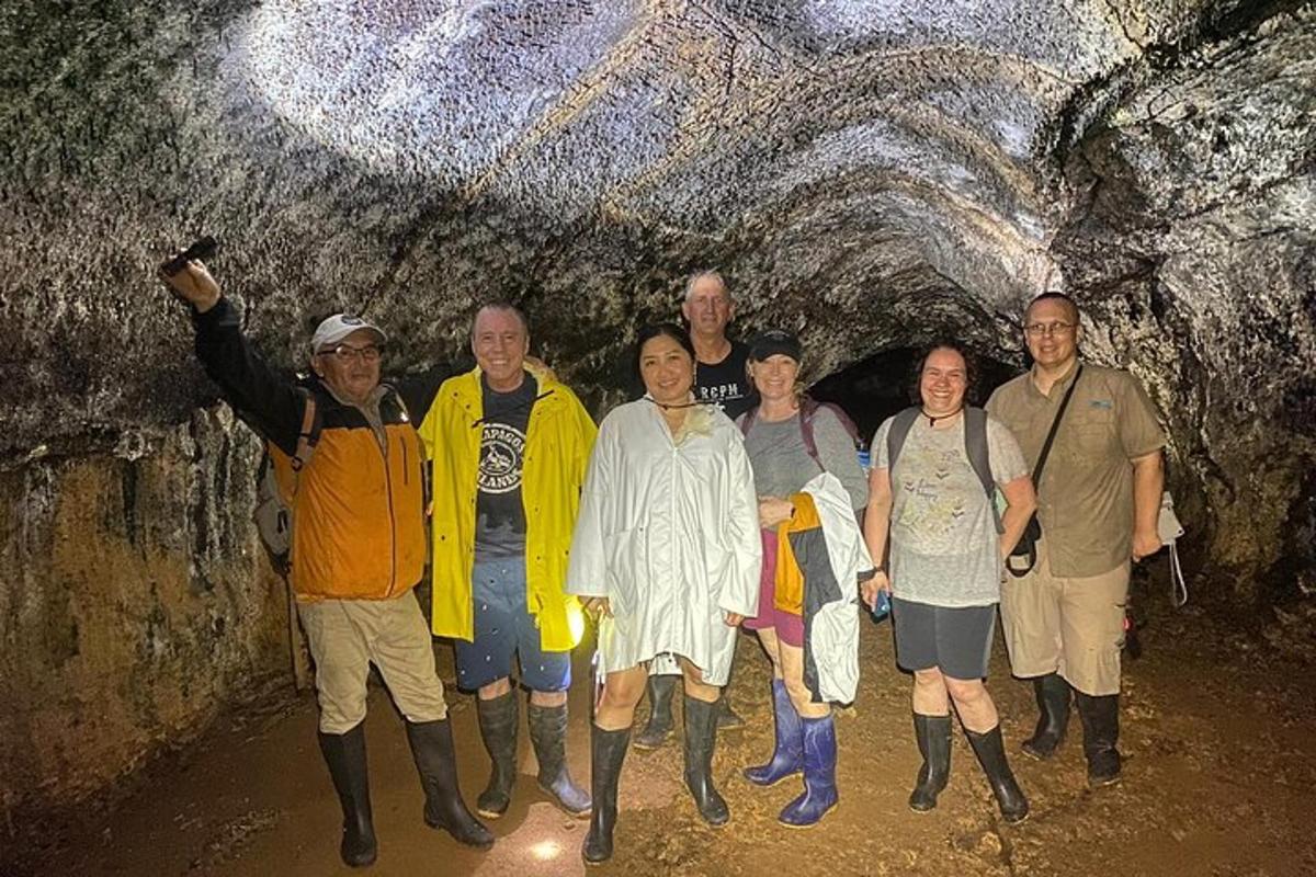 a group of people standing in a cave