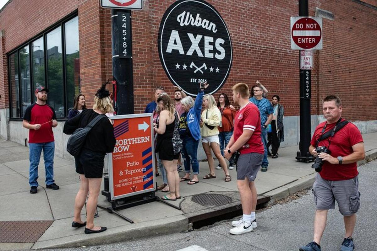 a group of people standing outside of a building