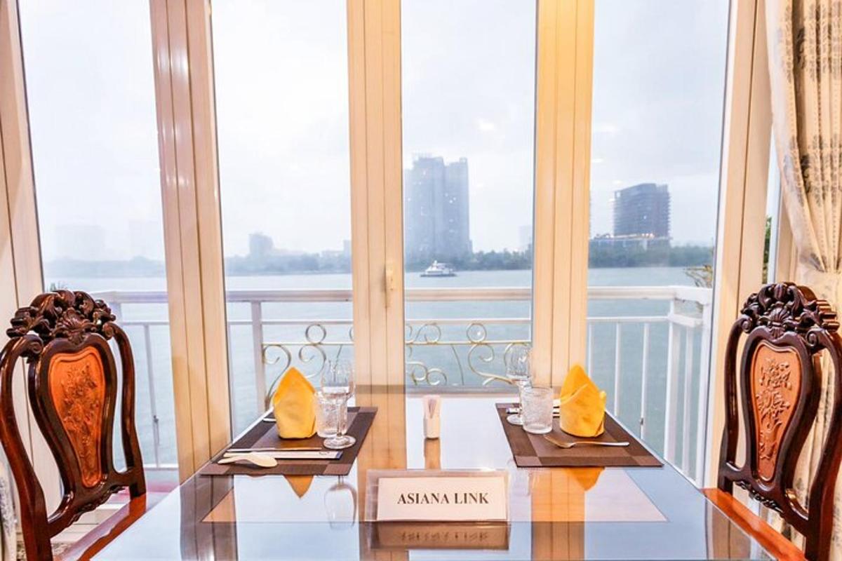 a dining room with a table and two chairs