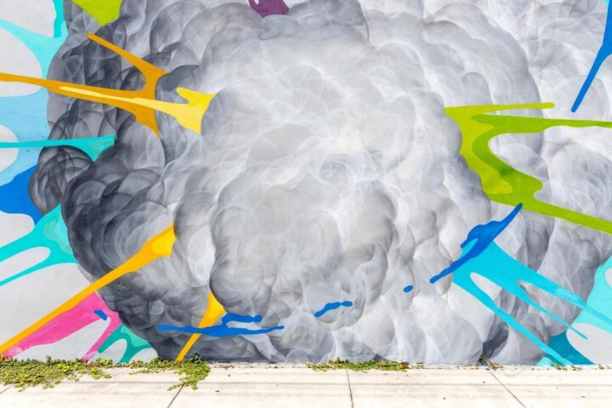 a mural of a cloud with arrows