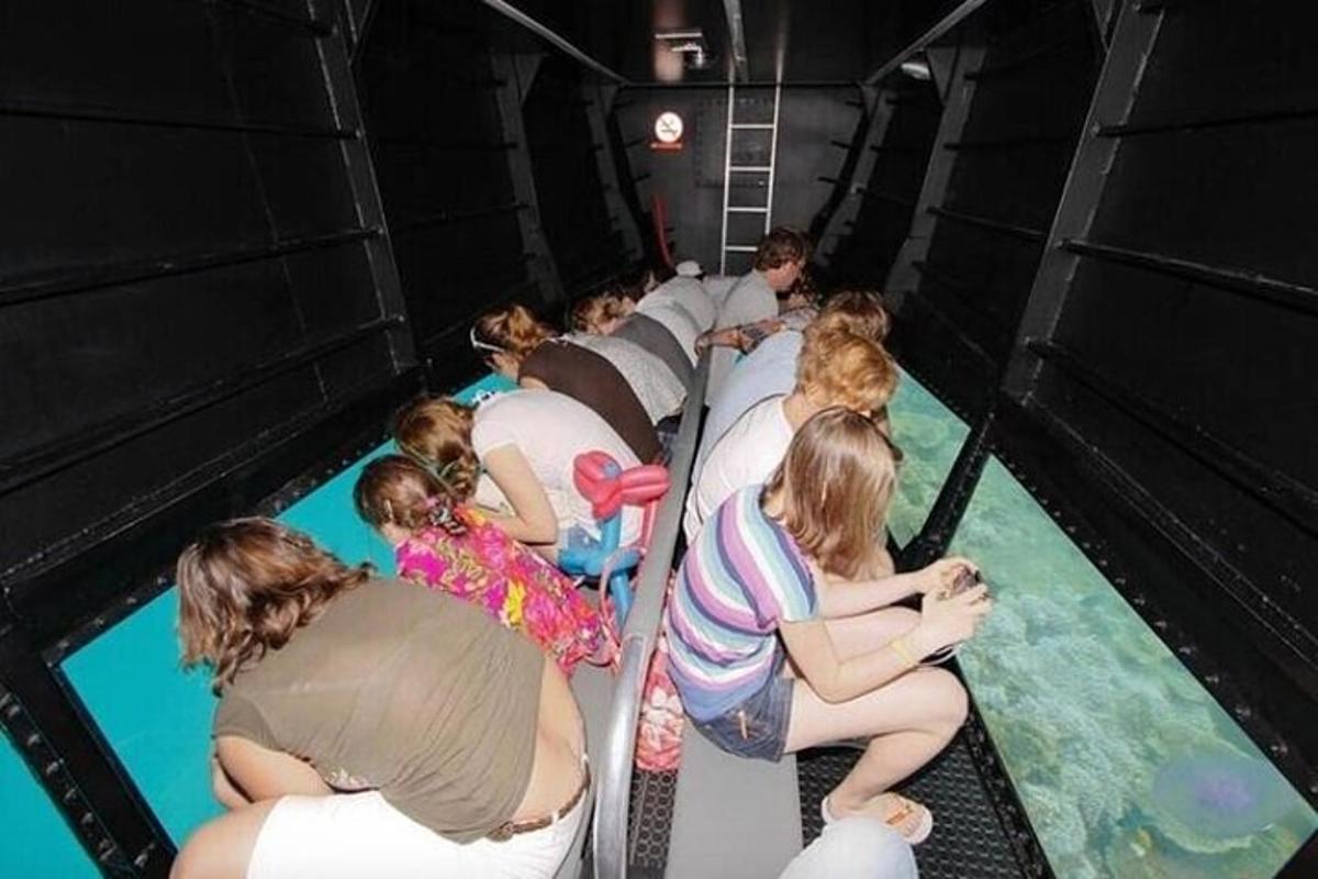 a group of people in a pool of water