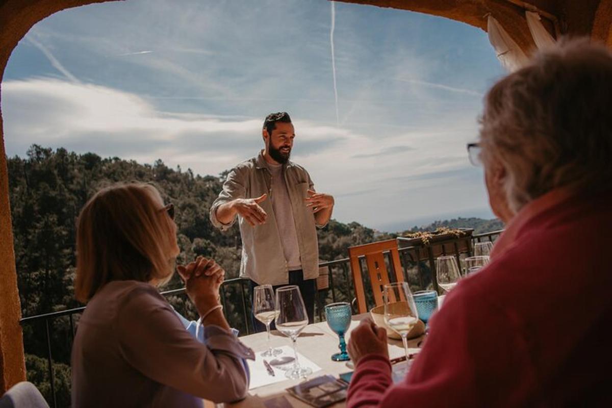 a group of people sitting at a table talking
