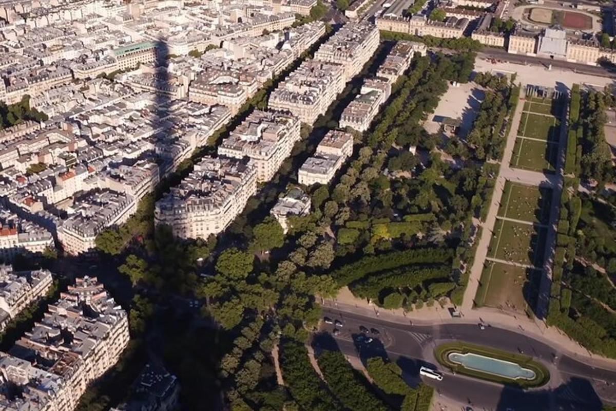 an overhead view of a city with buildings and a street