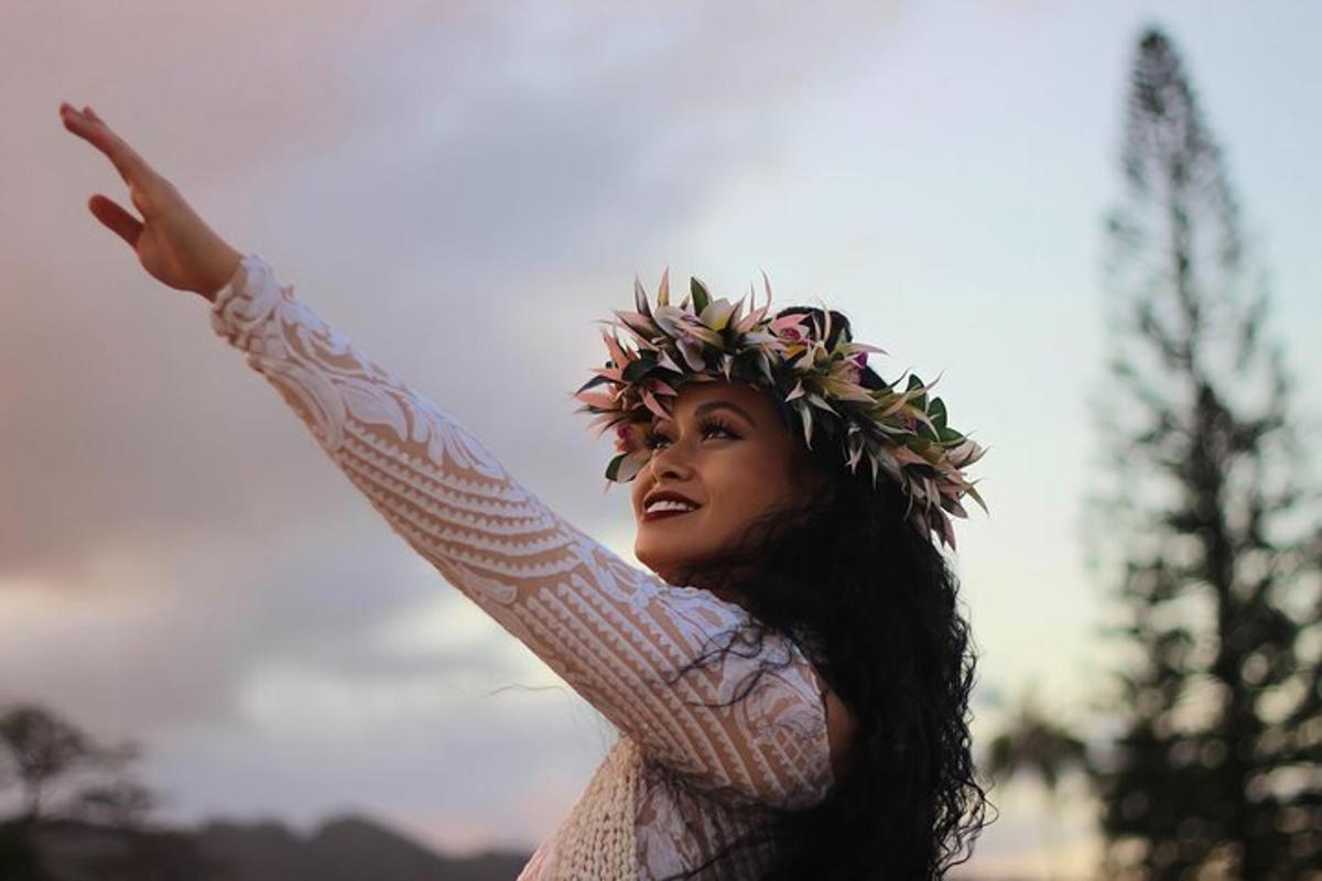 a woman with a flower wreath on her head