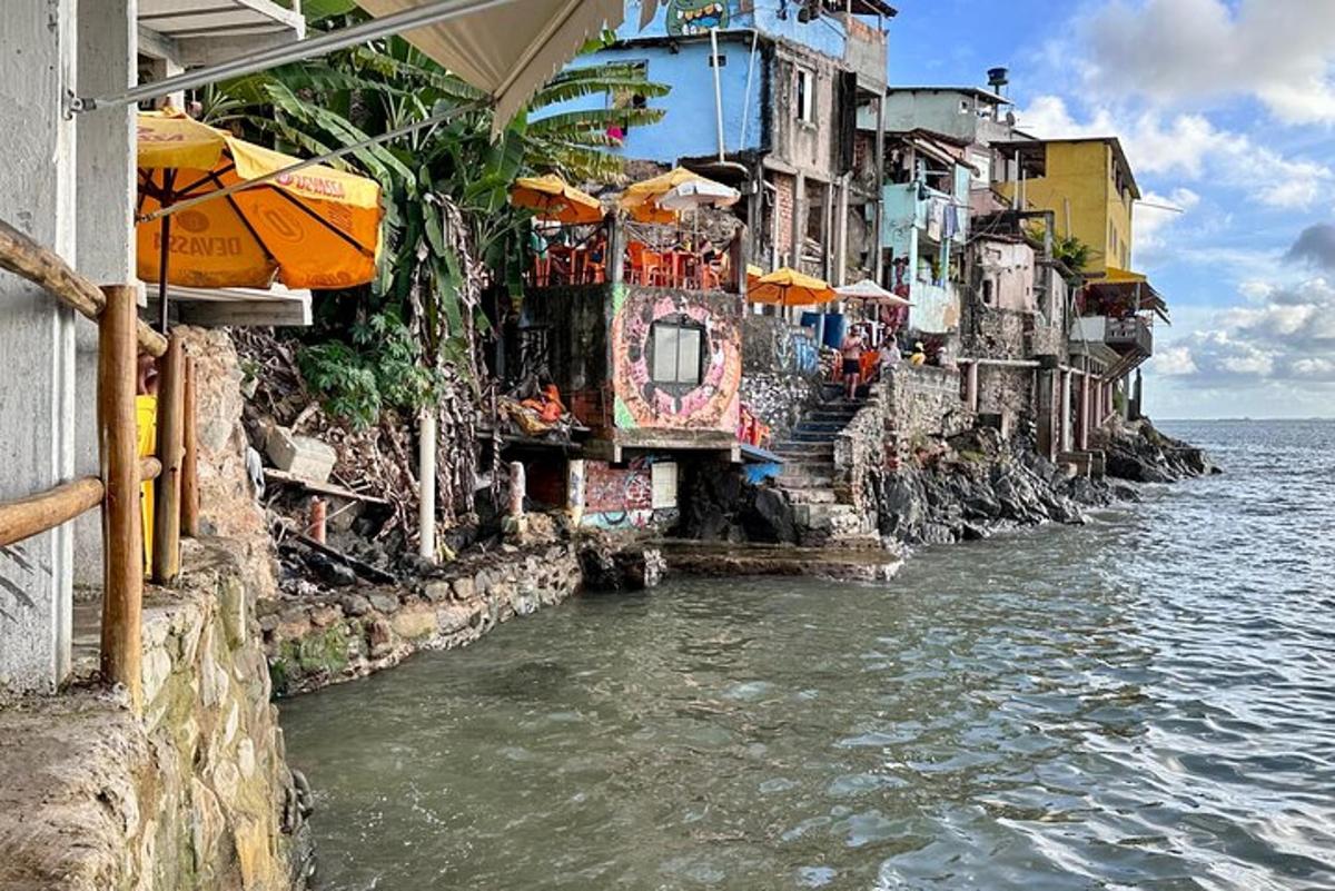 a group of buildings next to a body of water