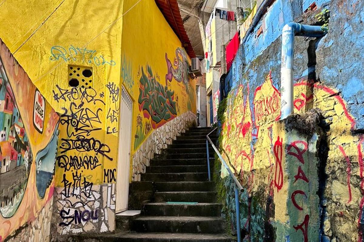a stairway in a building with graffiti on the wall