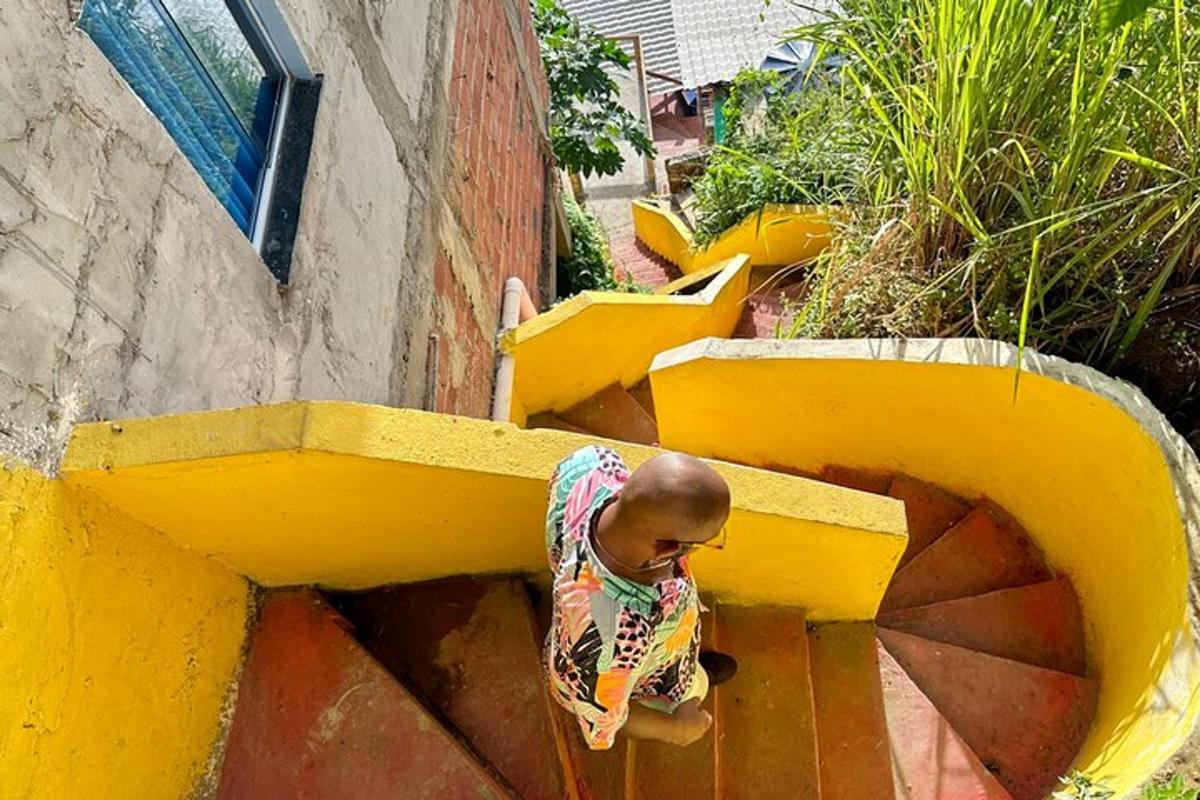 a man sitting on a set of stairs