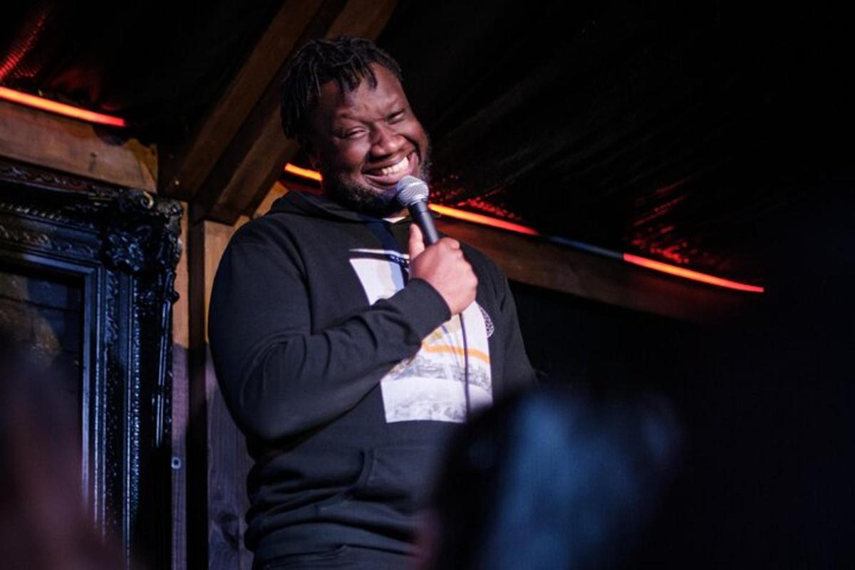 a man is singing into a microphone