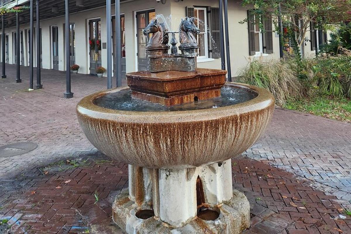 a water fountain in the middle of a street