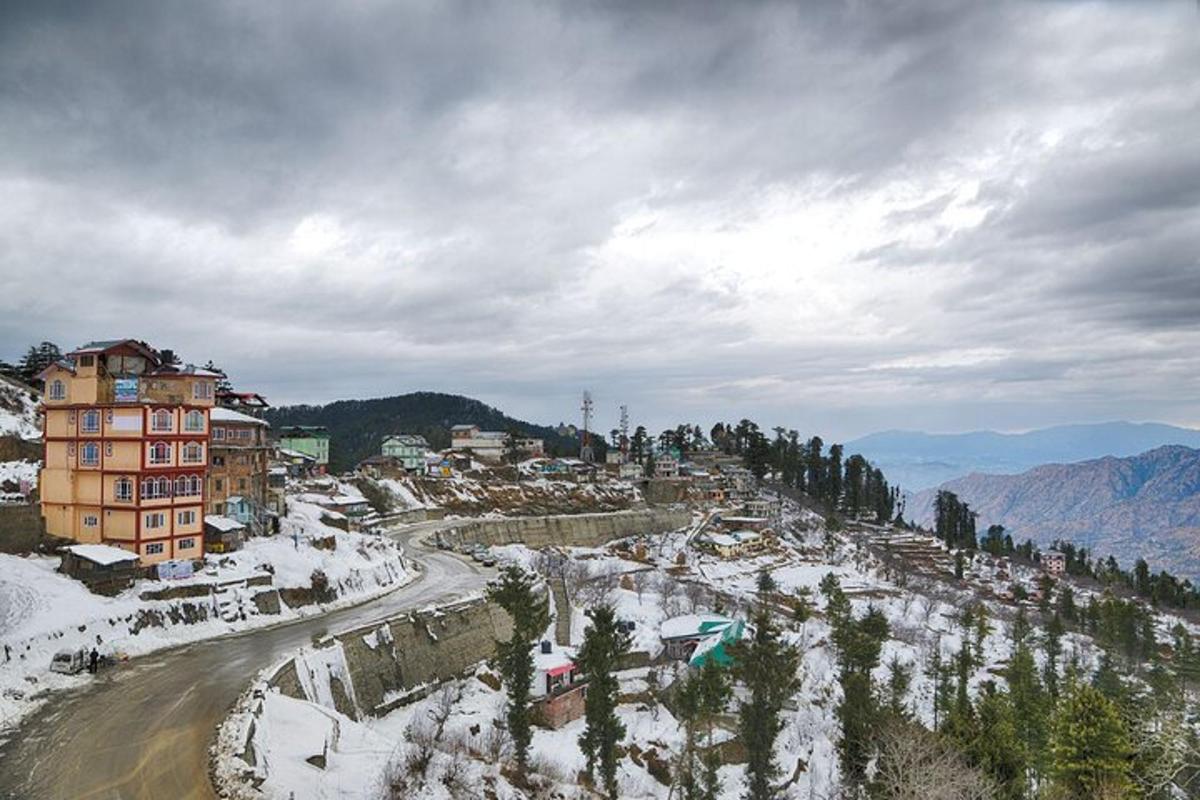 a town in the snow on a mountain