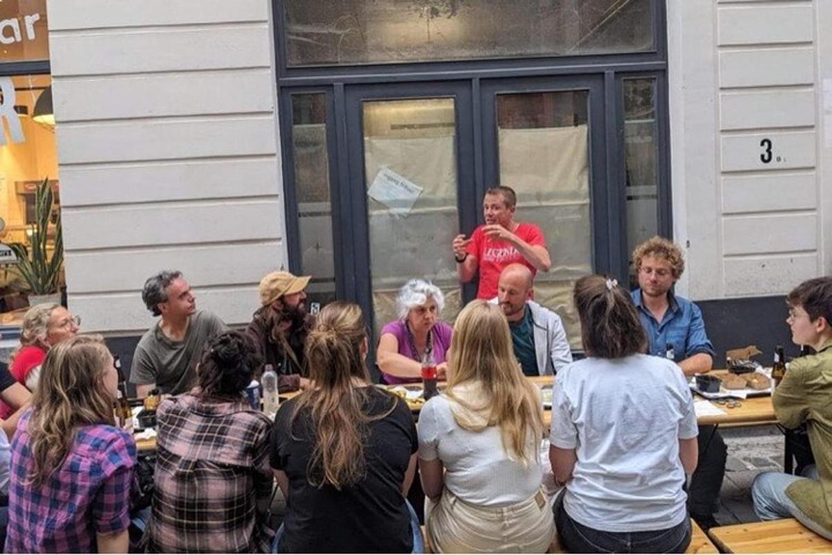a group of people sitting around a table