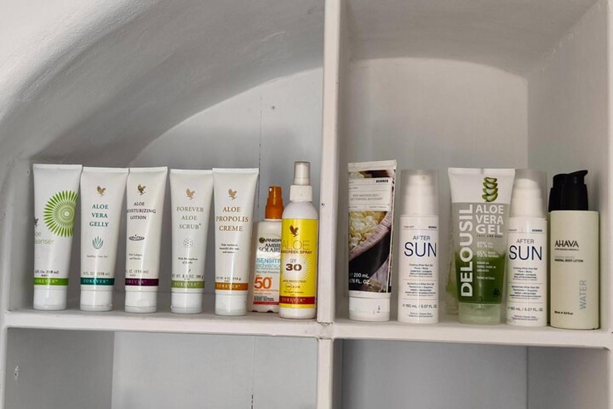 a shelf with a bunch of hair products on it