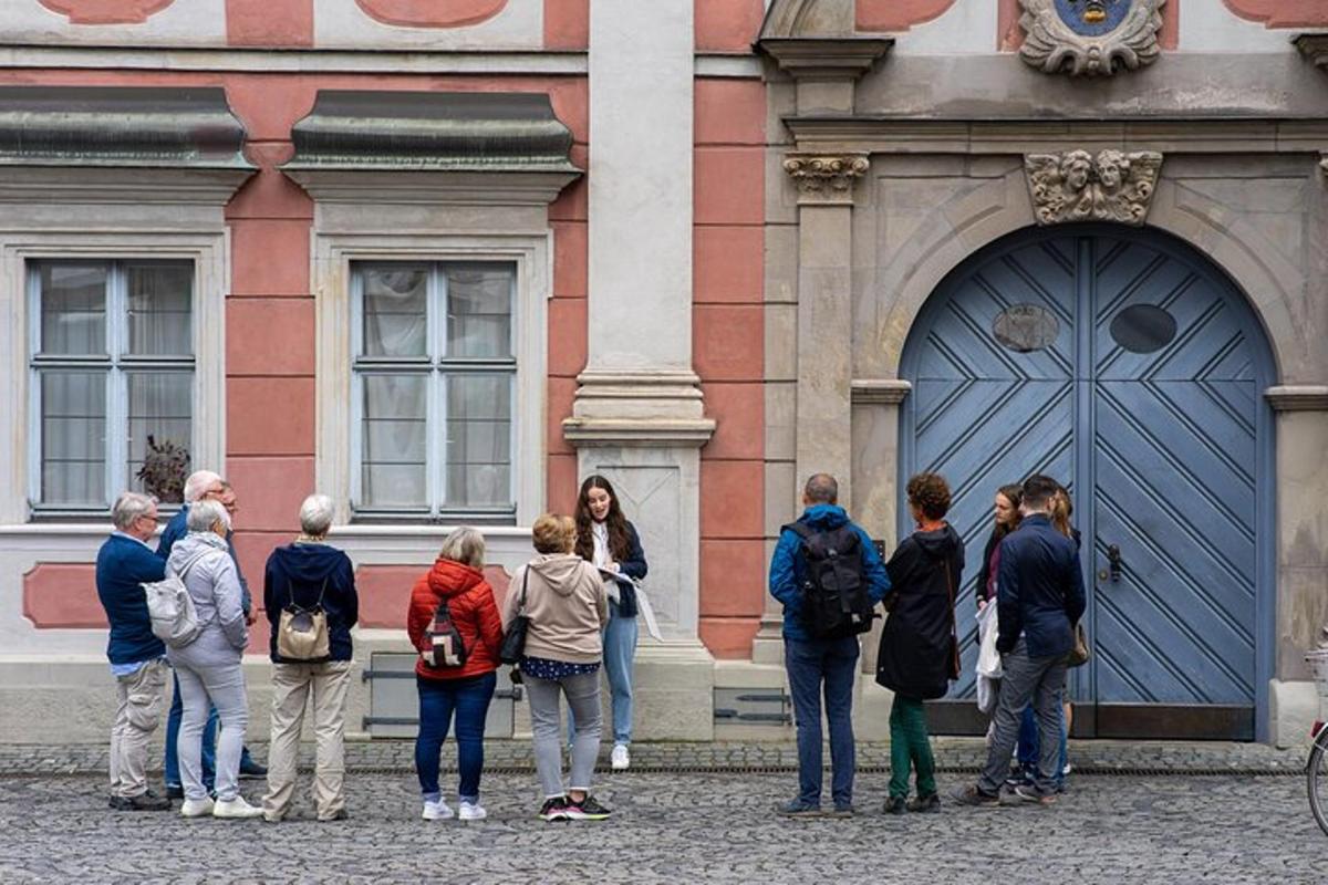 a group of people standing outside of a building