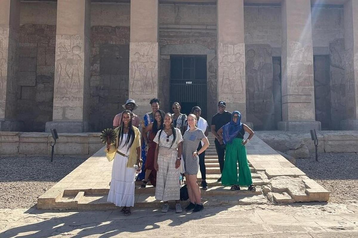 a group of people standing in front of a building