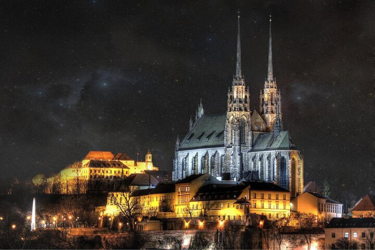 a large building with a cathedral at night