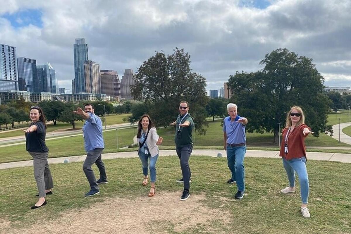 a group of people walking in a park