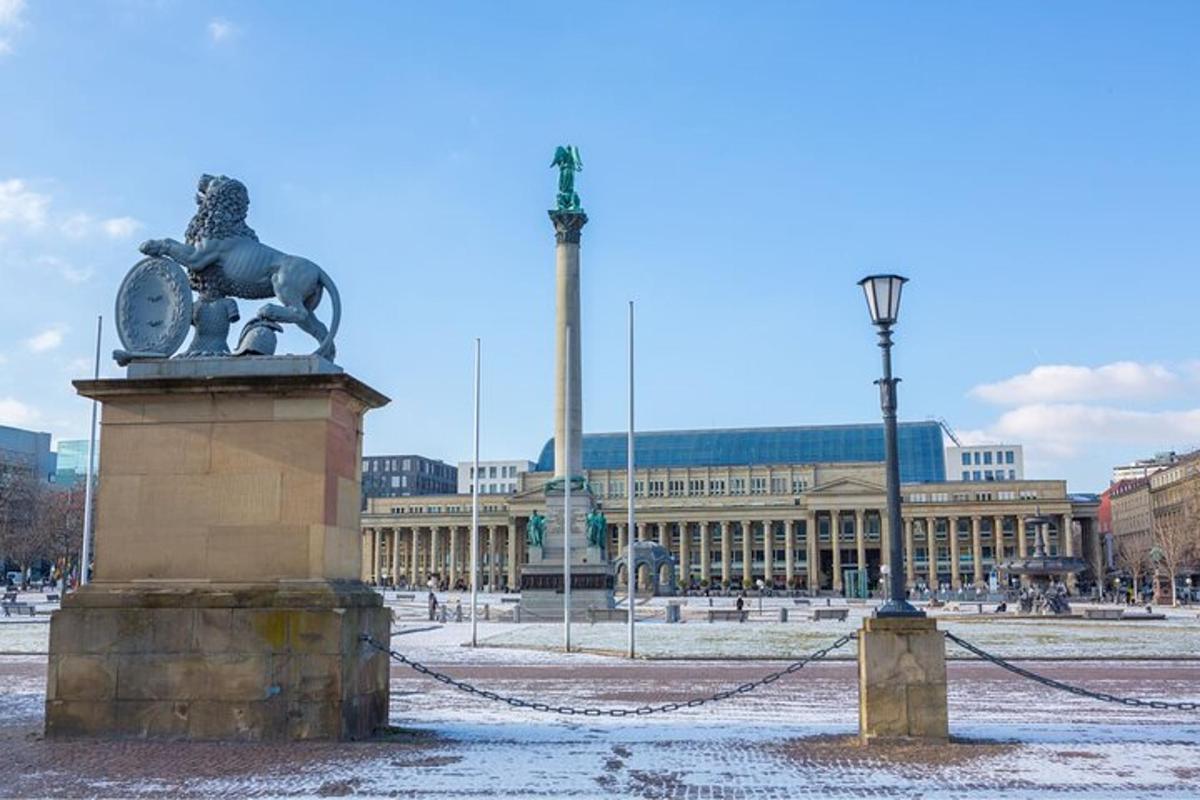 a statue in front of a large building