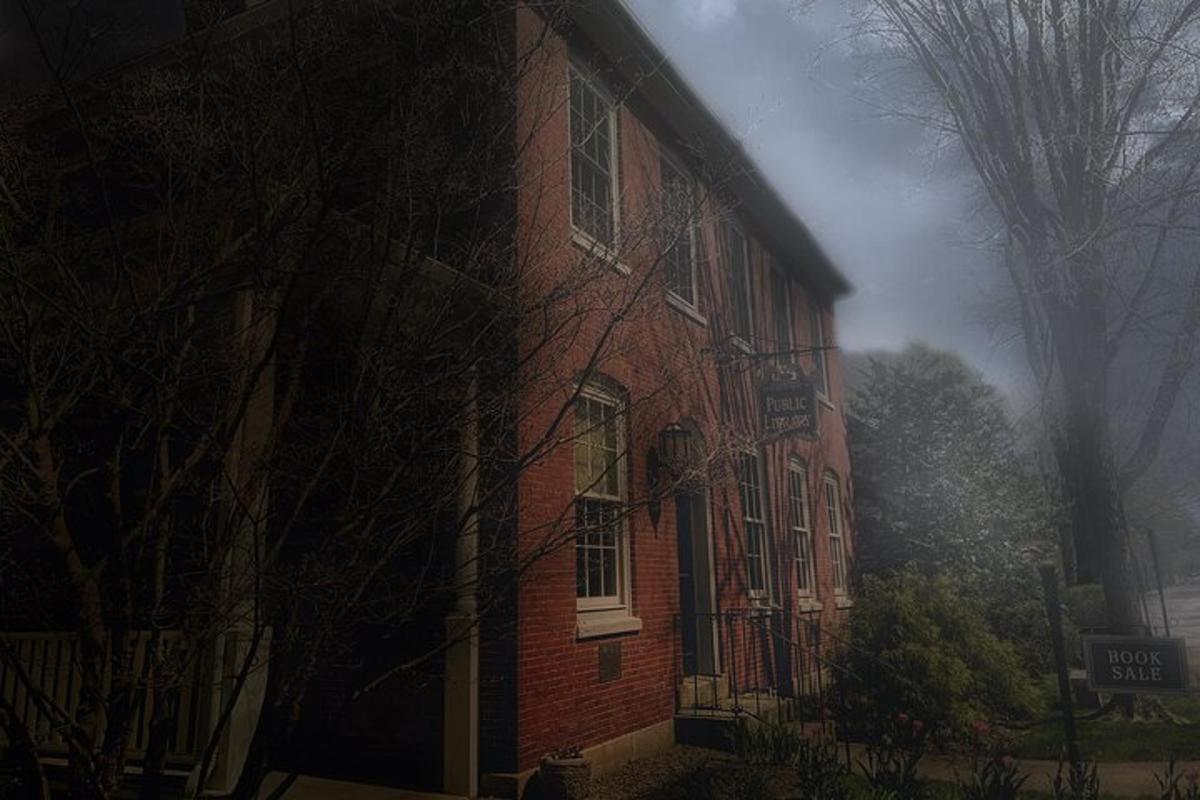 a red brick building on a foggy street