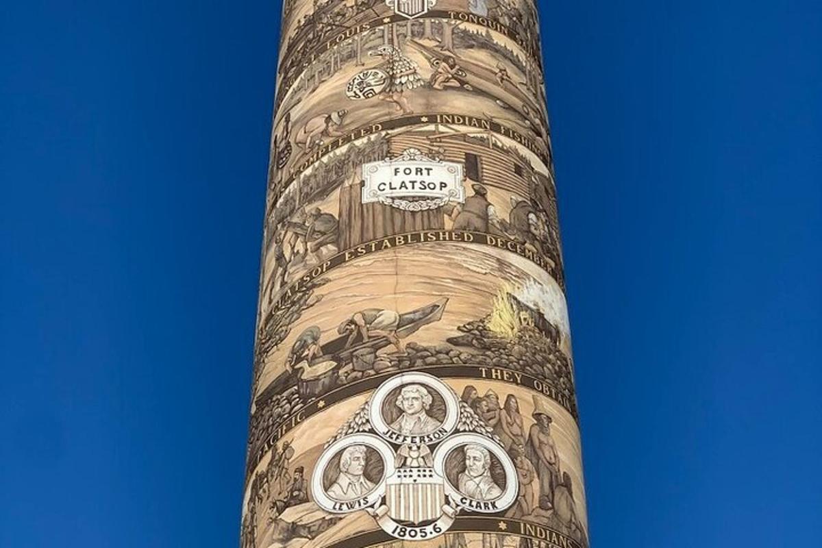 a tall tower with a mural on the side of it