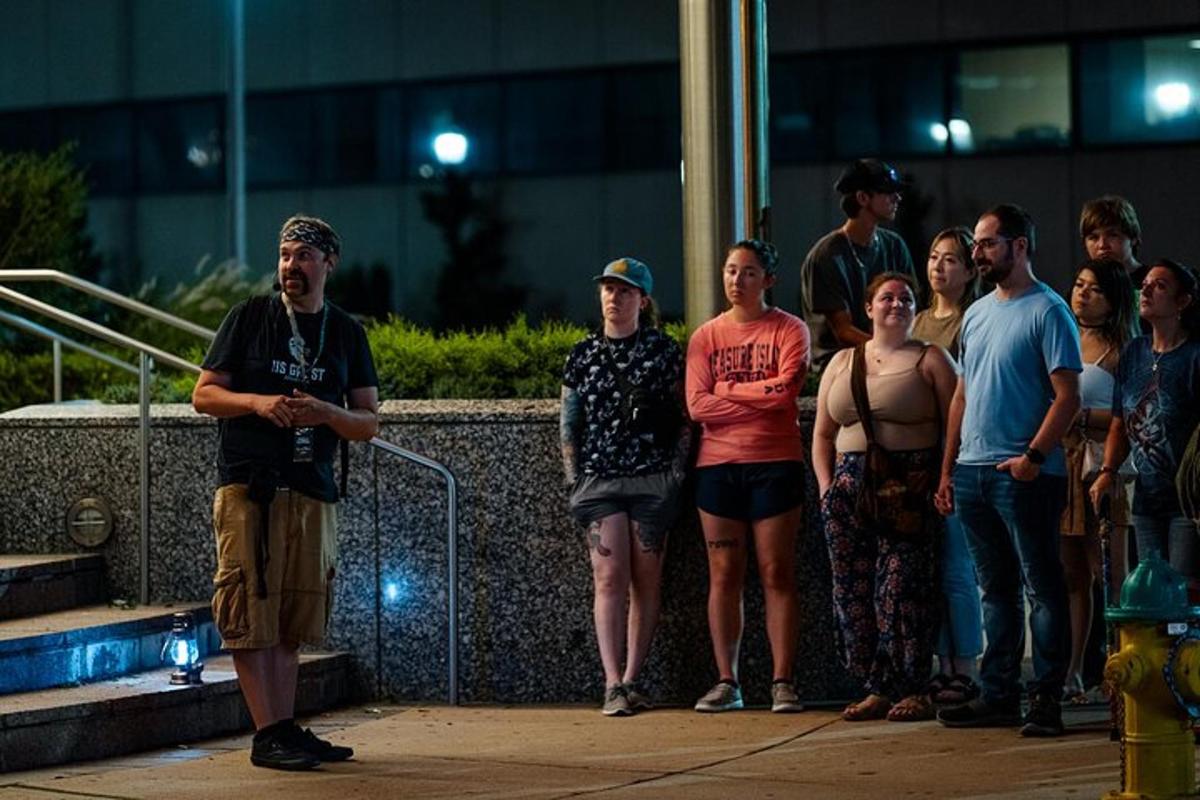a group of people standing next to a fire hydrant