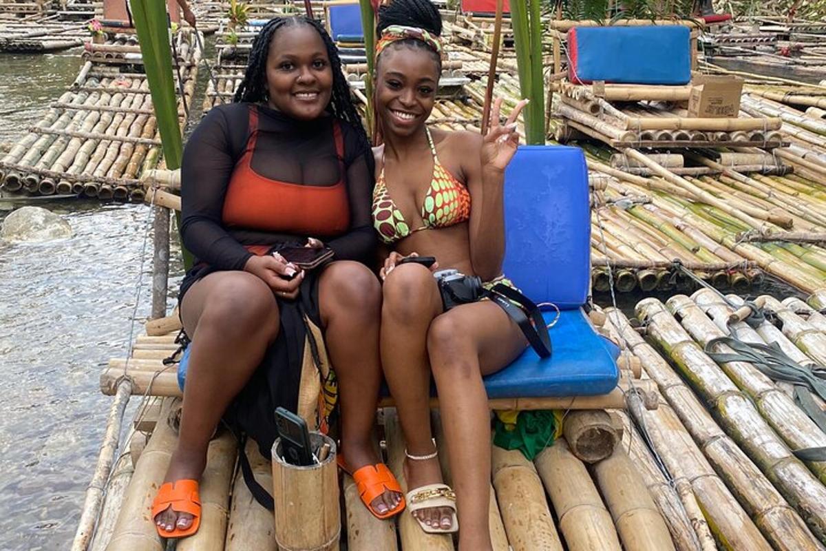 two women sitting on a raft in the water
