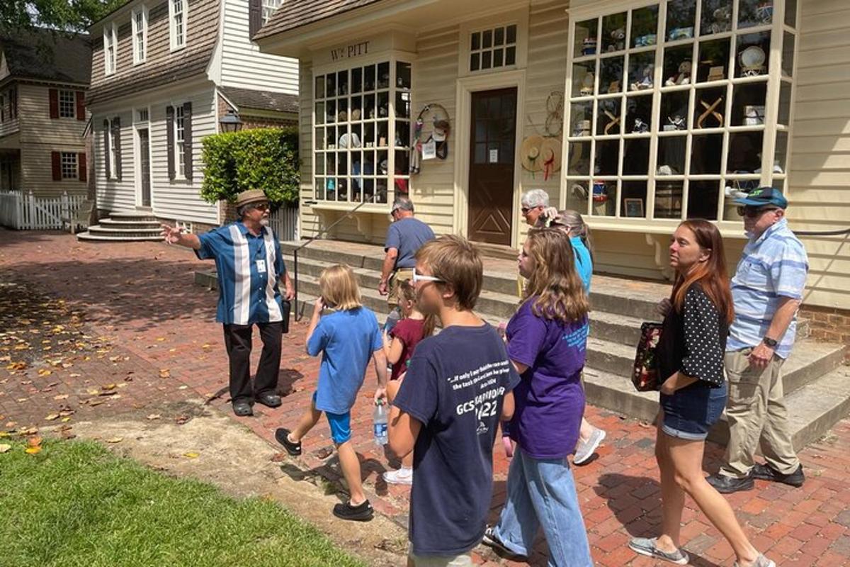 a group of people standing outside of a house