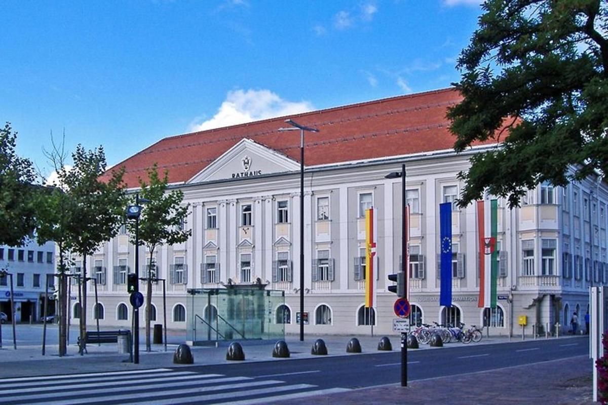 a large white building with a red roof