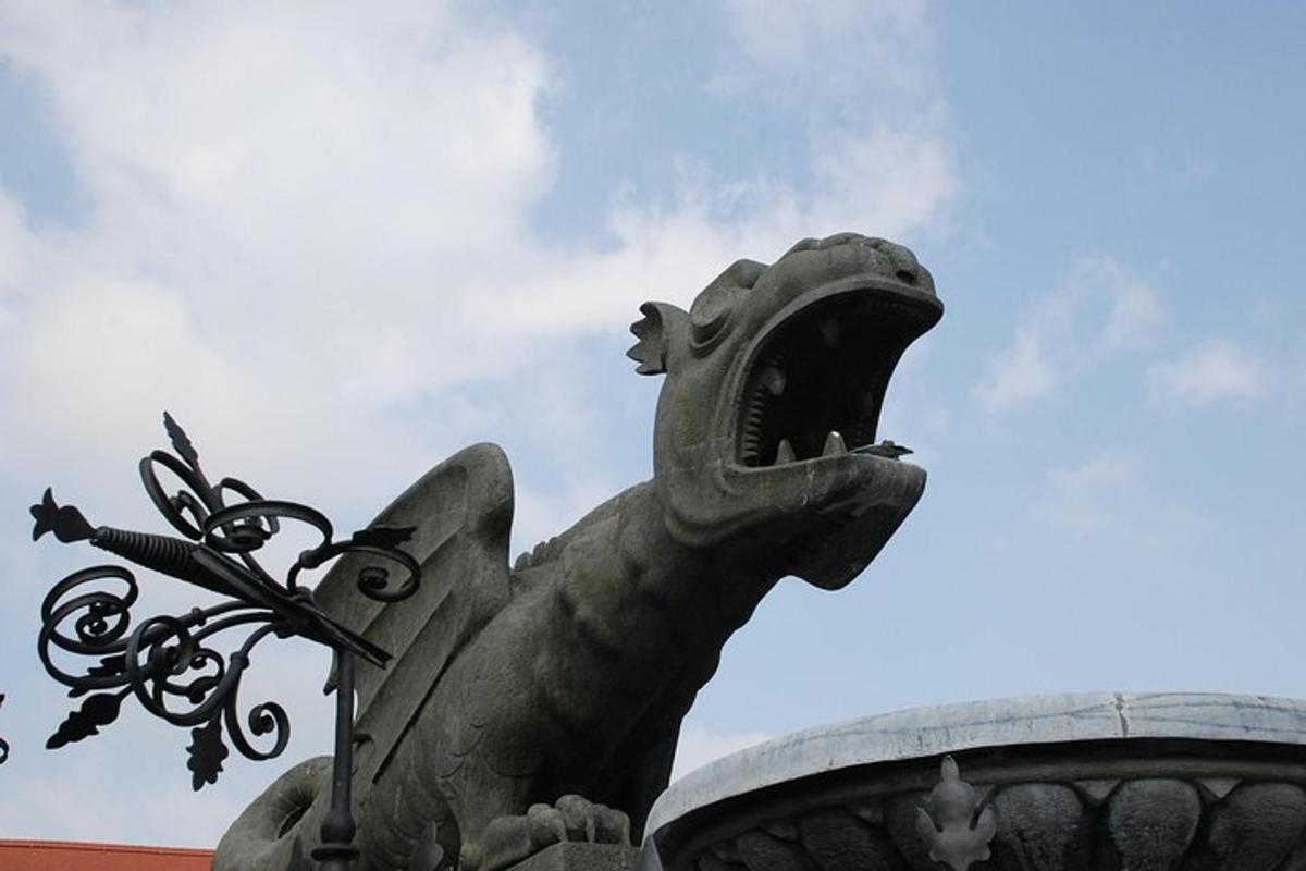 a statue of a bird on top of a building