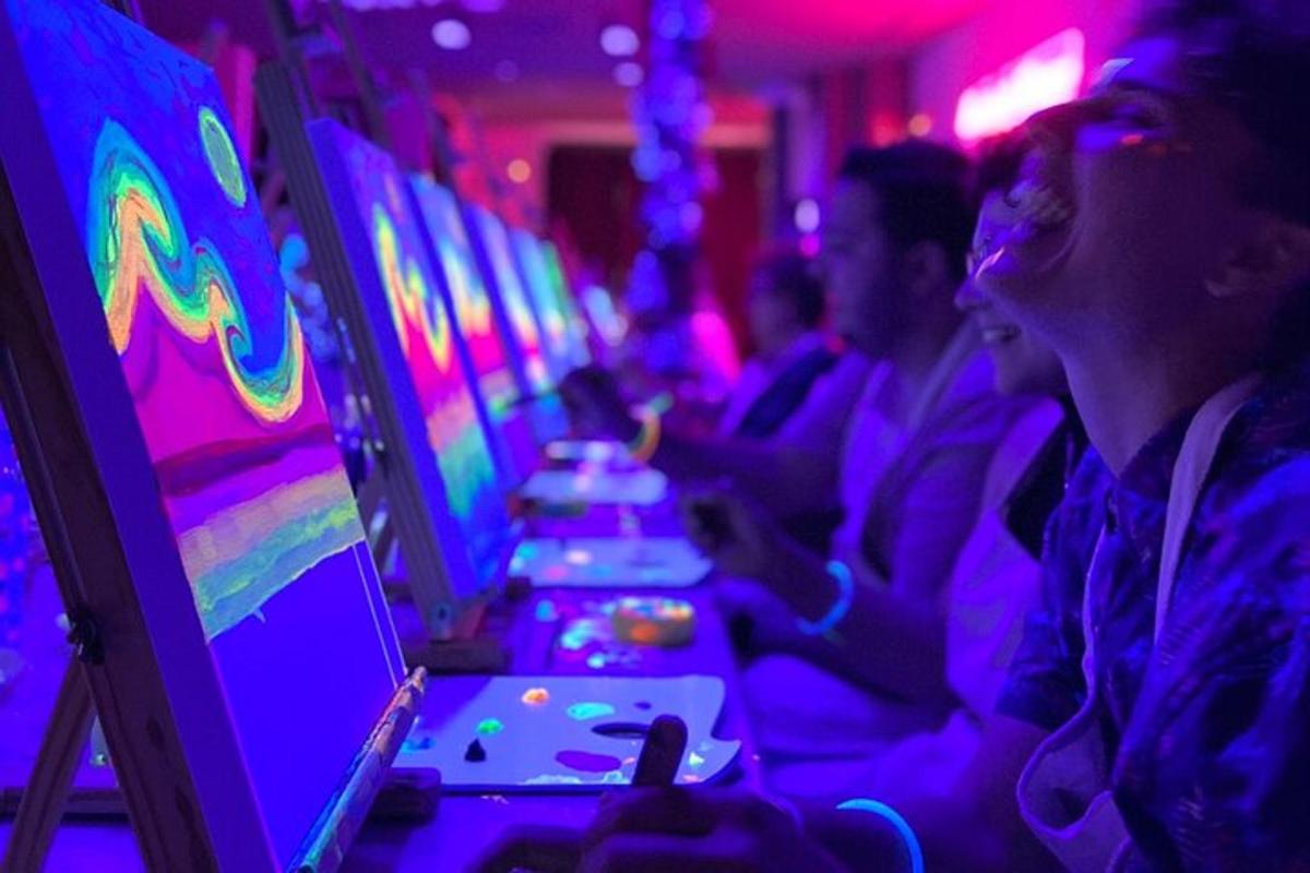un grupo de personas sentadas en una máquina tragamonedas