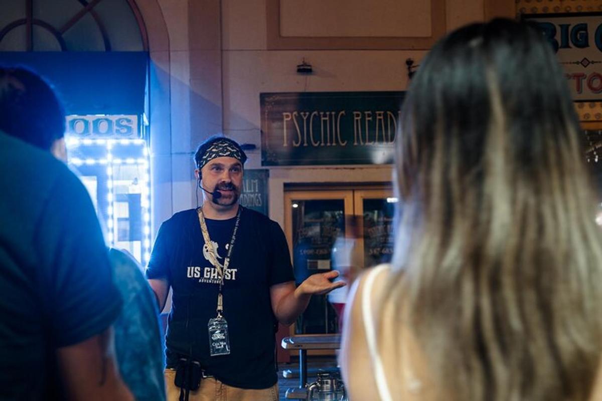 a man standing in a store talking to a woman