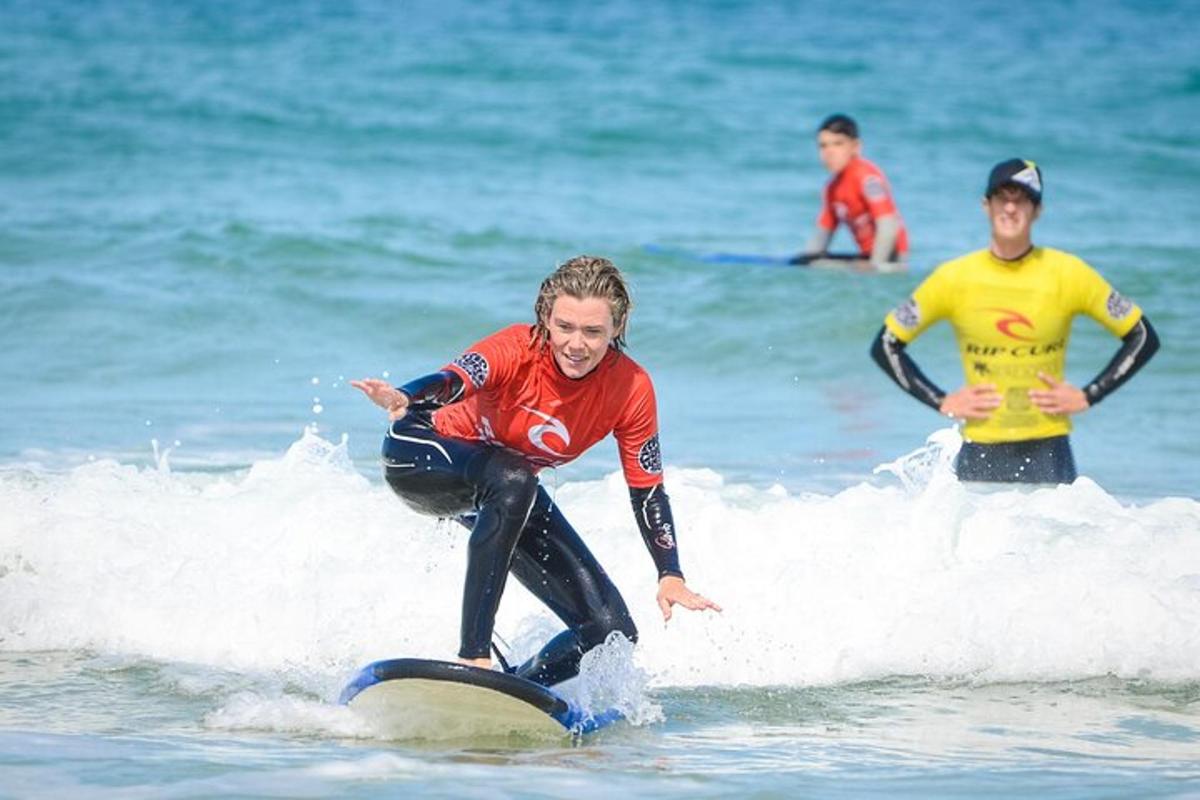 a man riding a wave on a surfboard in the ocean