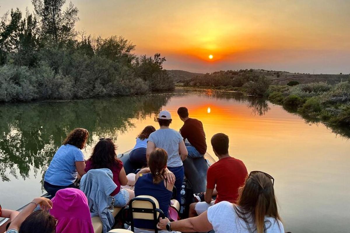 a group of people on a boat on a river