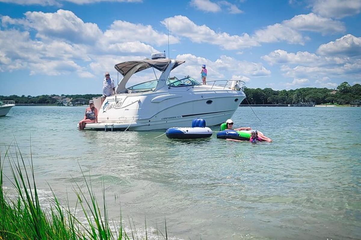 a group of people on a boat in the water
