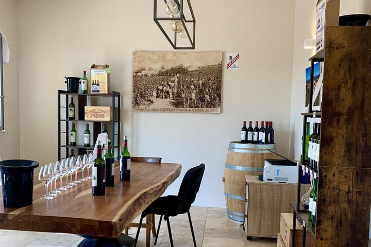 a tasting room with a table with wine bottles