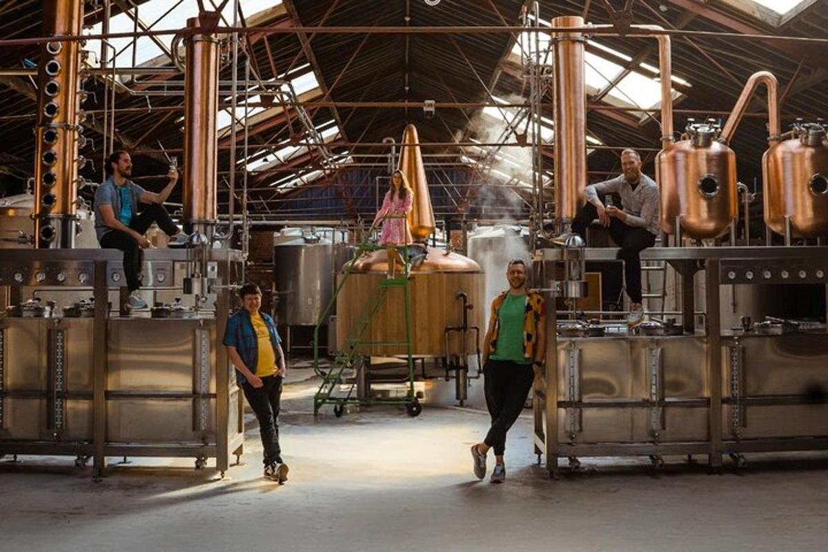 a group of people walking inside of a brewery