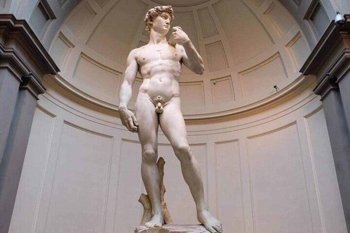a statue of a man standing in a room