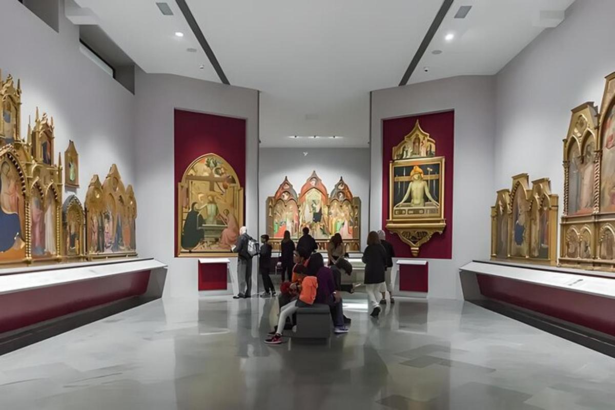a group of people looking at art in a museum