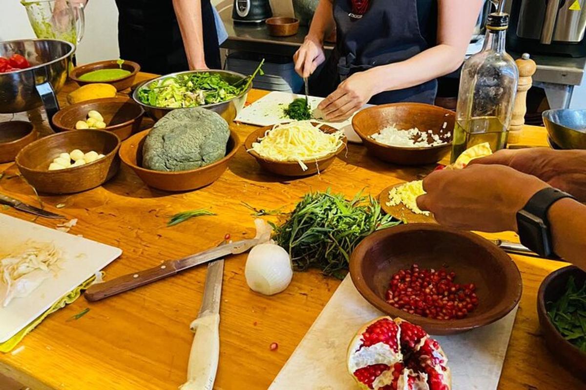 a table topped with bowls of food and vegetables