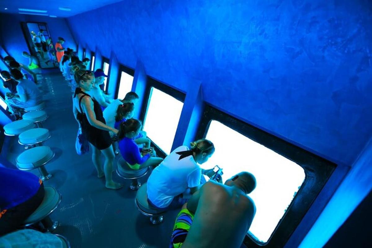 a group of people sitting in chairs in a room