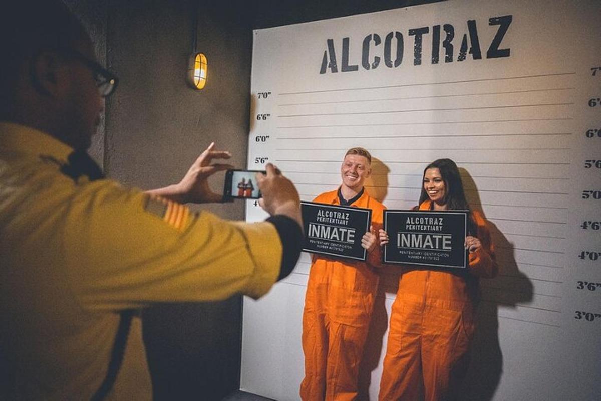 a man taking a picture of two women holding signs