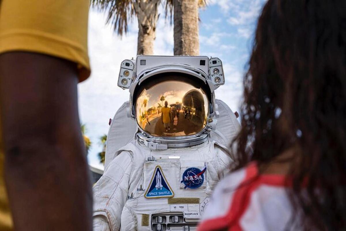 a person in an astronaut suit with a camera on his head
