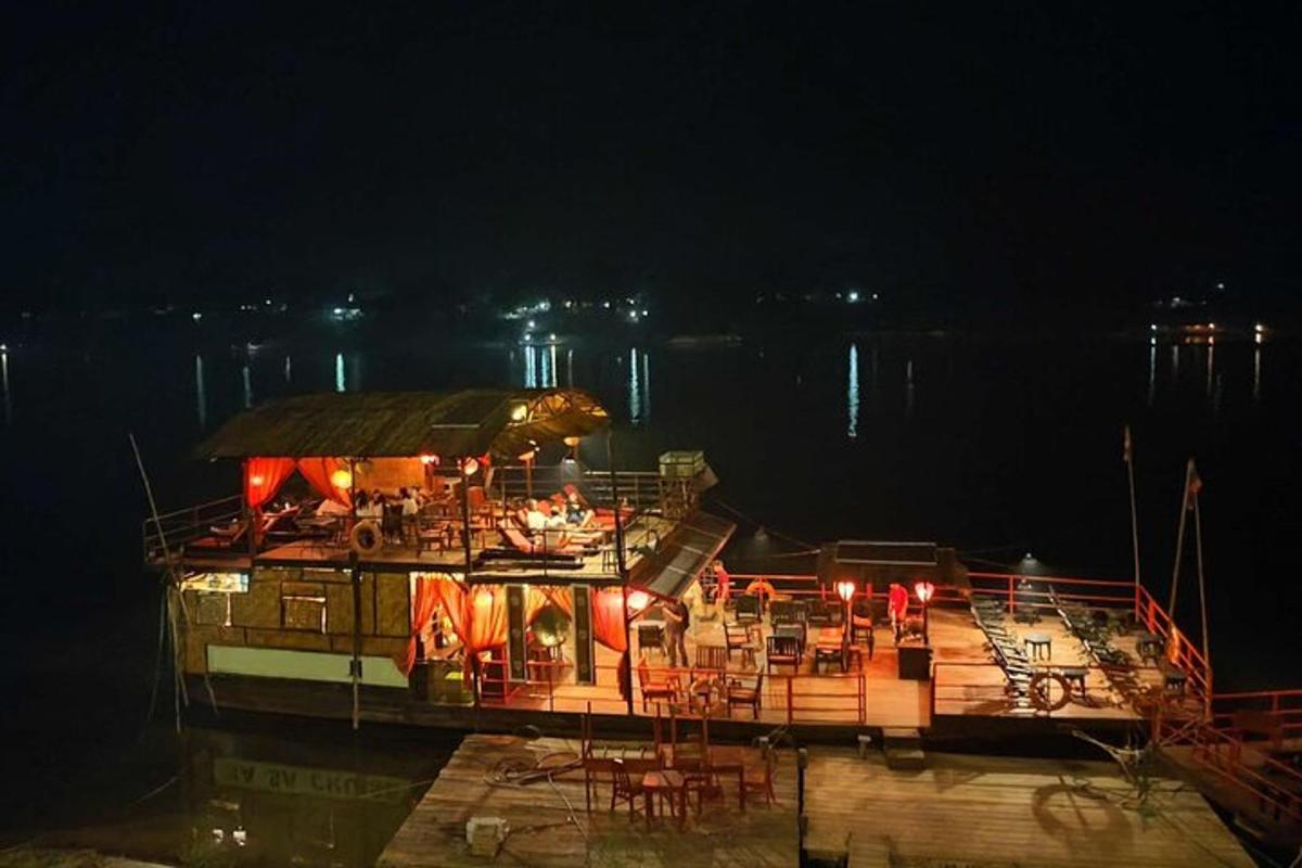 a large boat in the water at night