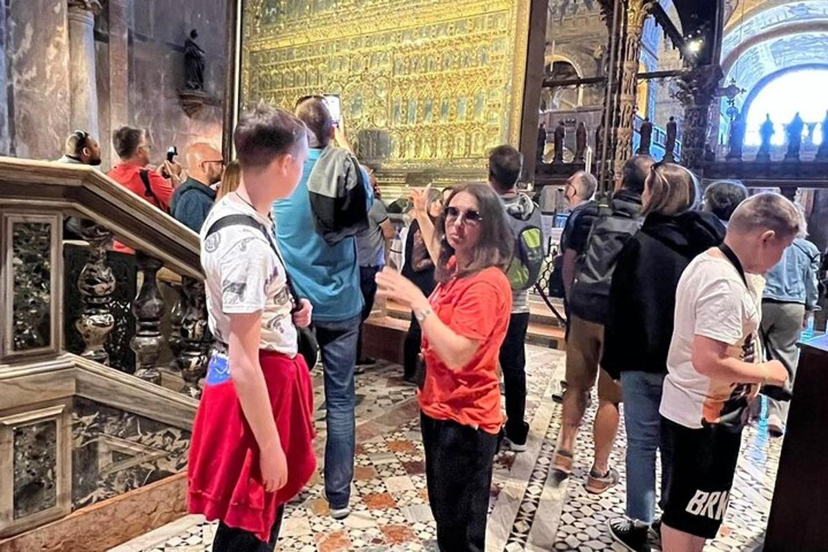 a group of people looking at a painting in a museum