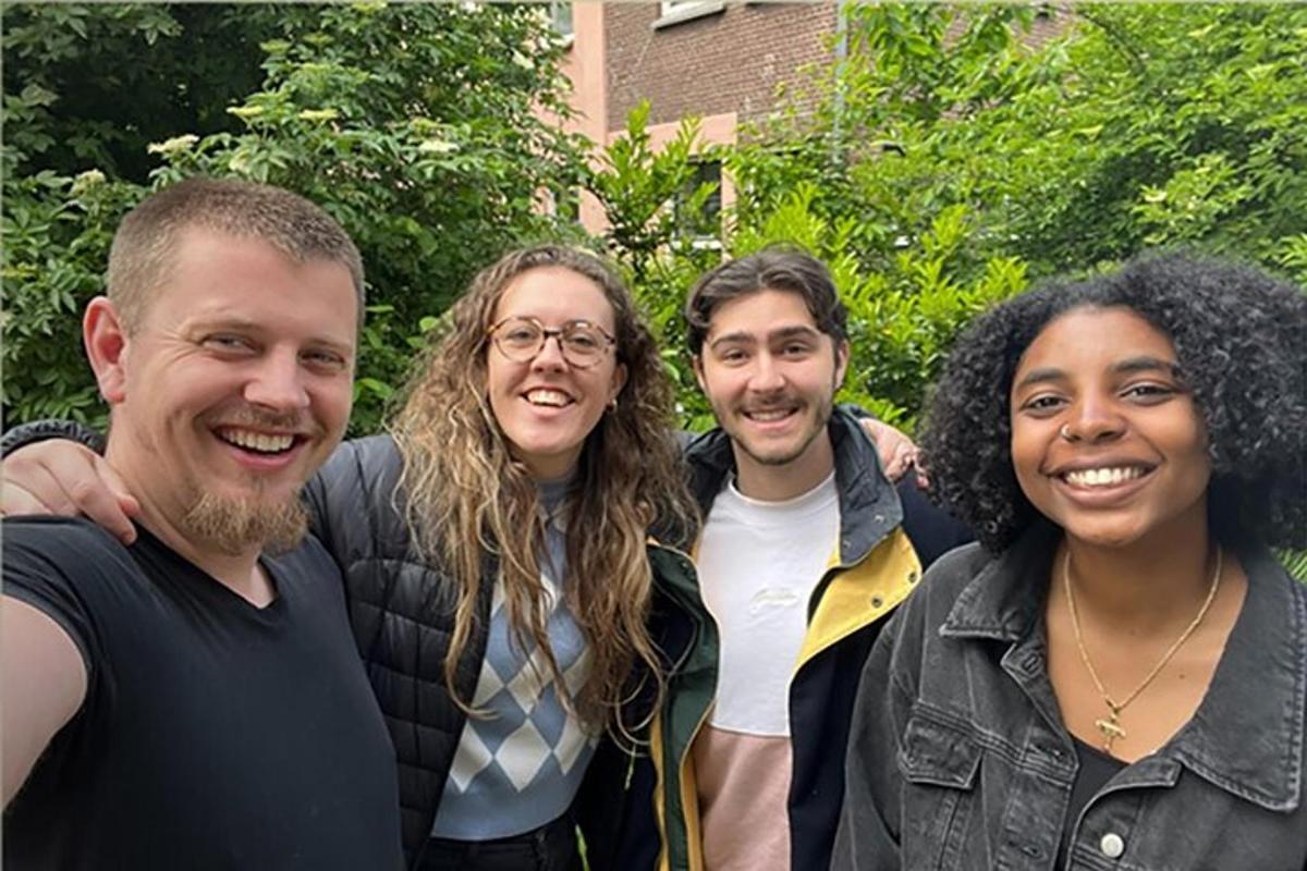a group of people posing for a picture
