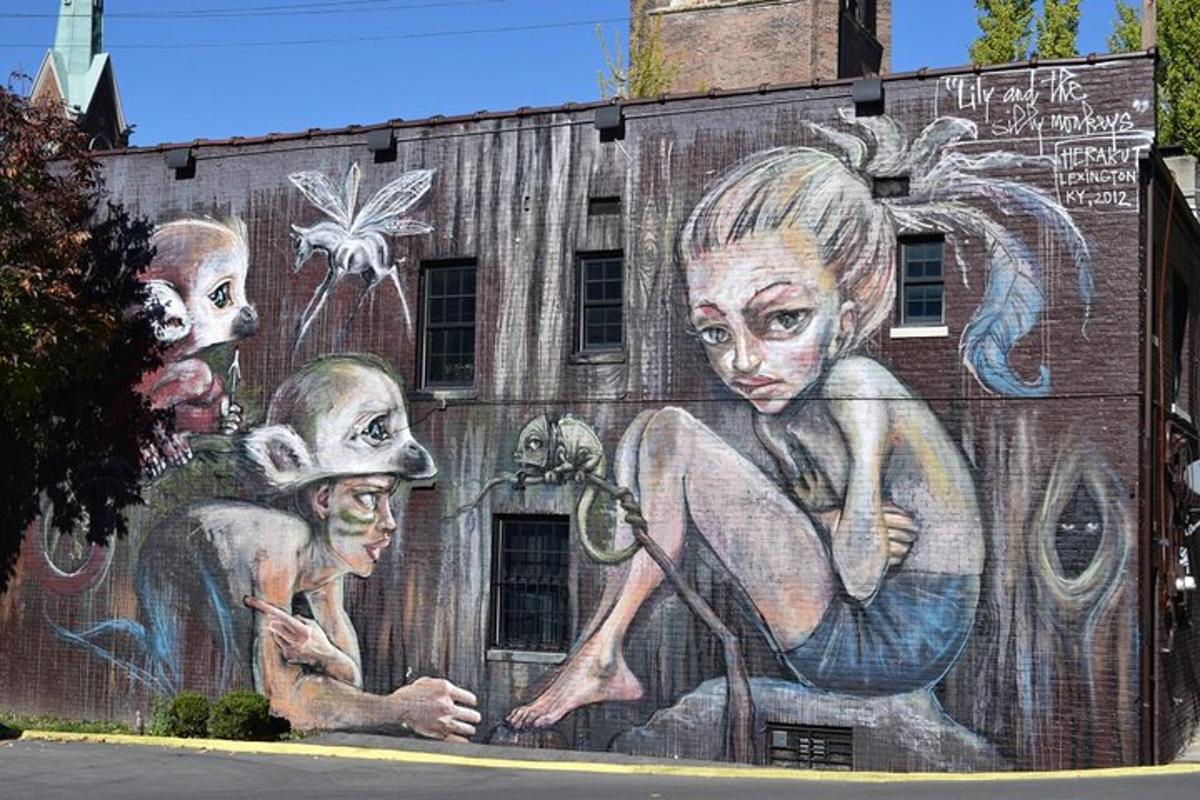 a mural of women on the side of a building