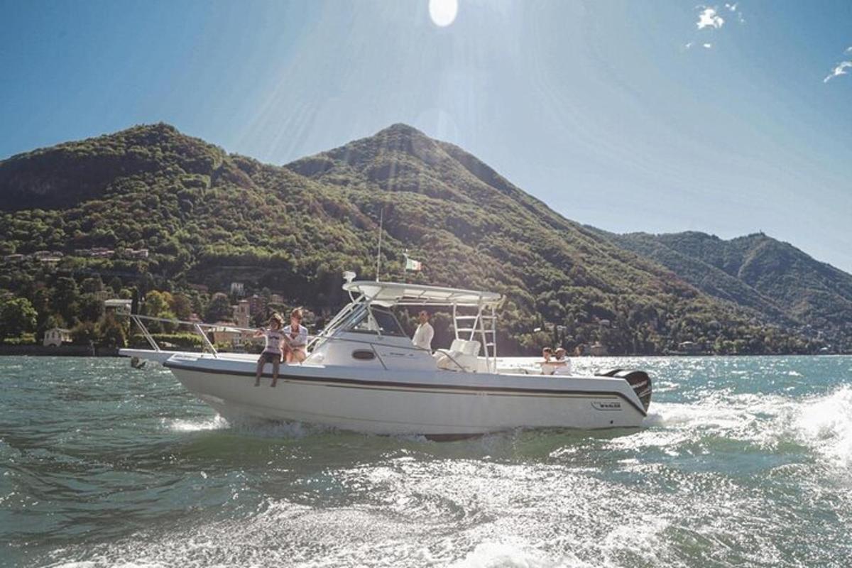 a group of people on a boat in the water