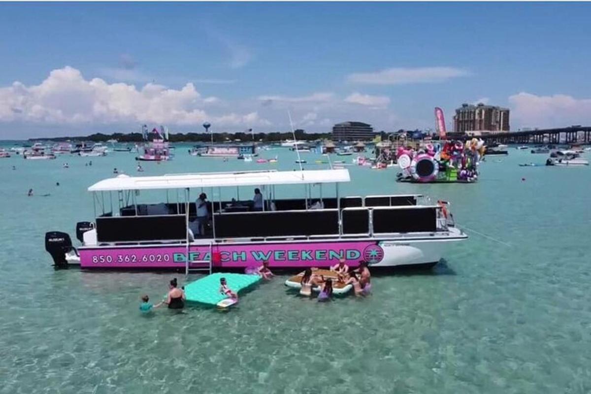 a group of people in the water near a boat